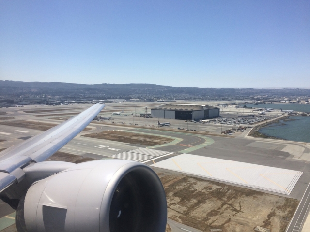 United 777-200 wingview departing San Francisco International – SFO