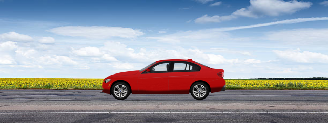 red bmw car on a road