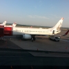 Norwegian 737-800 Parked at Stockholm Arlanda with Austrian Fokker 100 in the Backround