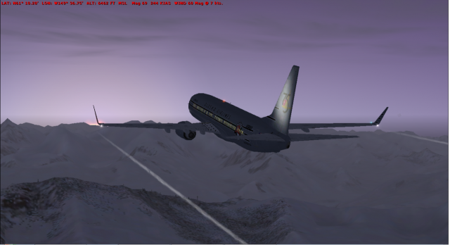 Me climbing out of ANC in a beautiful sunrise in Alaska Airlines' retro livery