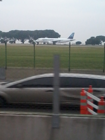 LAN Airbus A320 waiting to position on track 13 with OneWorld livery