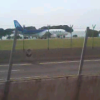 LAN A320 taking off from track 13